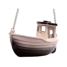 Ceramic sauna boat with hanging chain.