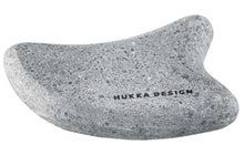 Hukka Guasha massage stone made of soapstone.